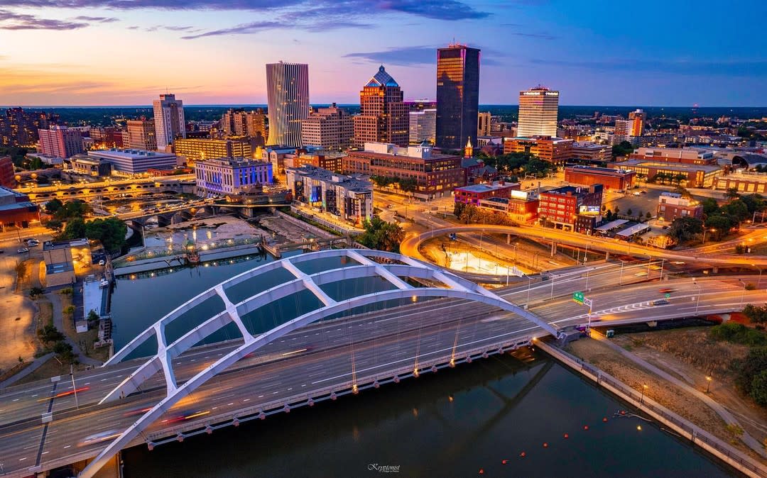 Downtown Rochester skyline and Frederick Douglass-Susan B. Anthony Memorial Bridge at sunset